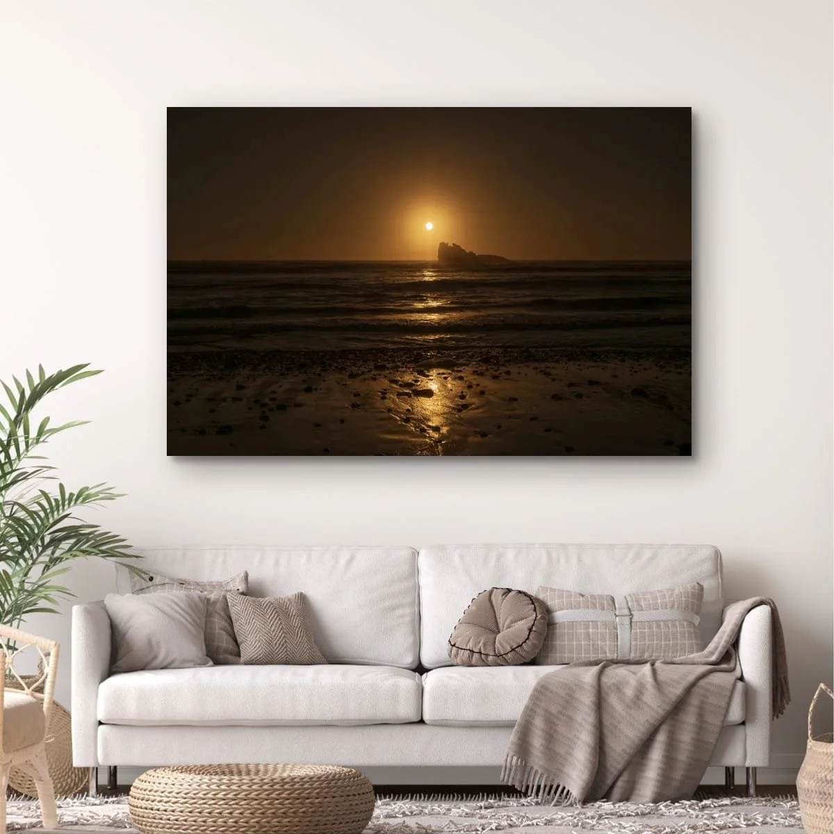 Golden sunset above offshore rock reflecting across the Tasman Sea.