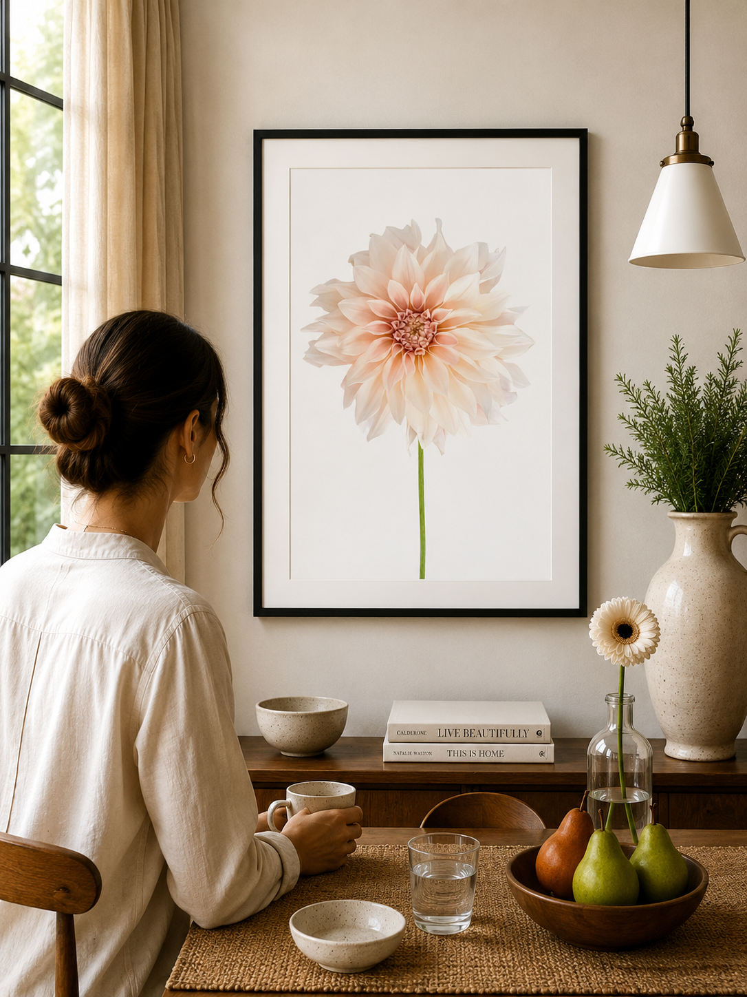 Pale blush dahlia flower on a soft neutral background.