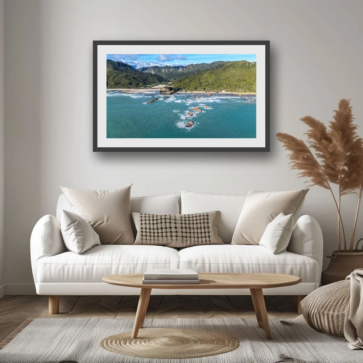 Aerial view of rocky coastline and ocean currents on New Zealand's West Coast.