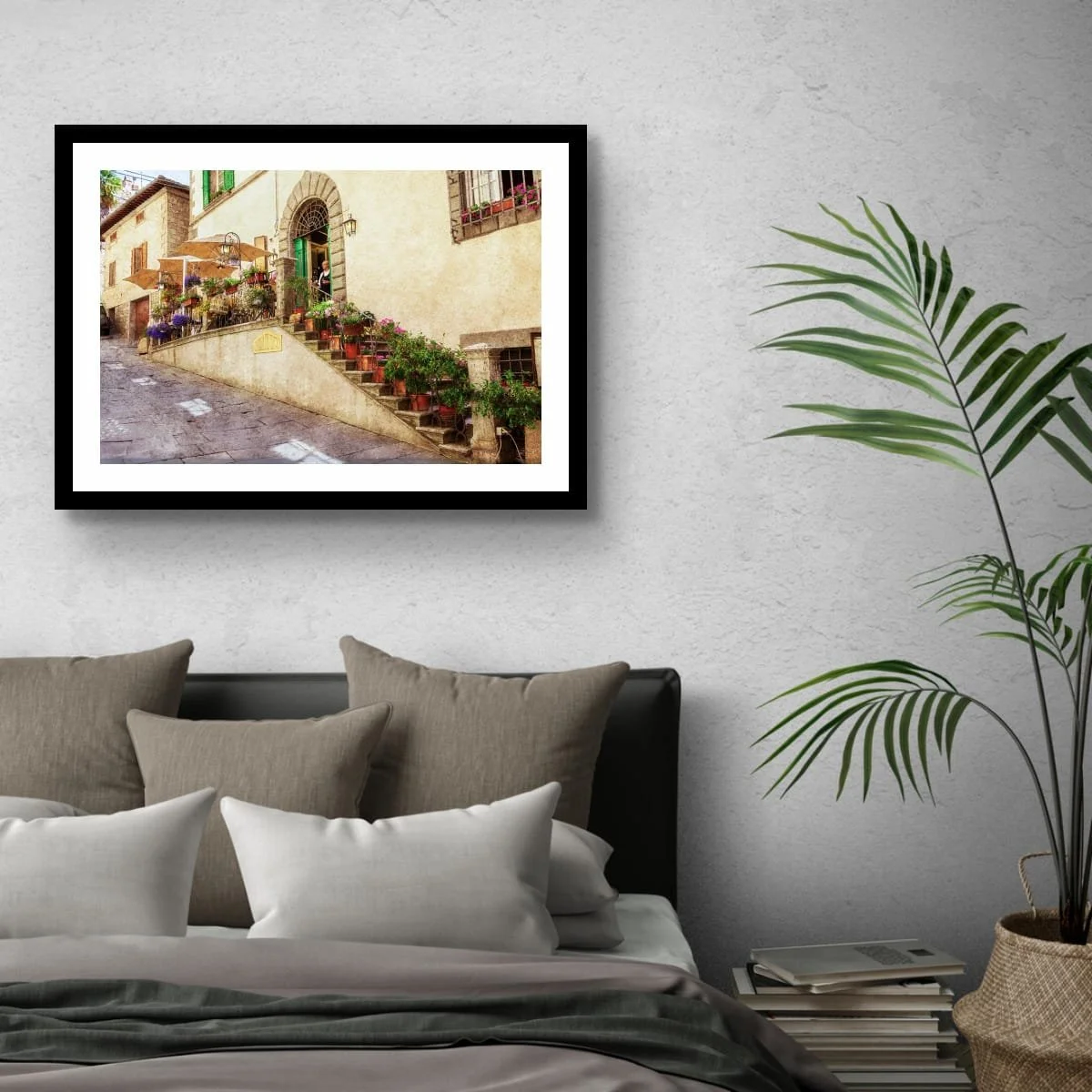 Traditional Italian osteria with flower-lined staircase and stone facade.