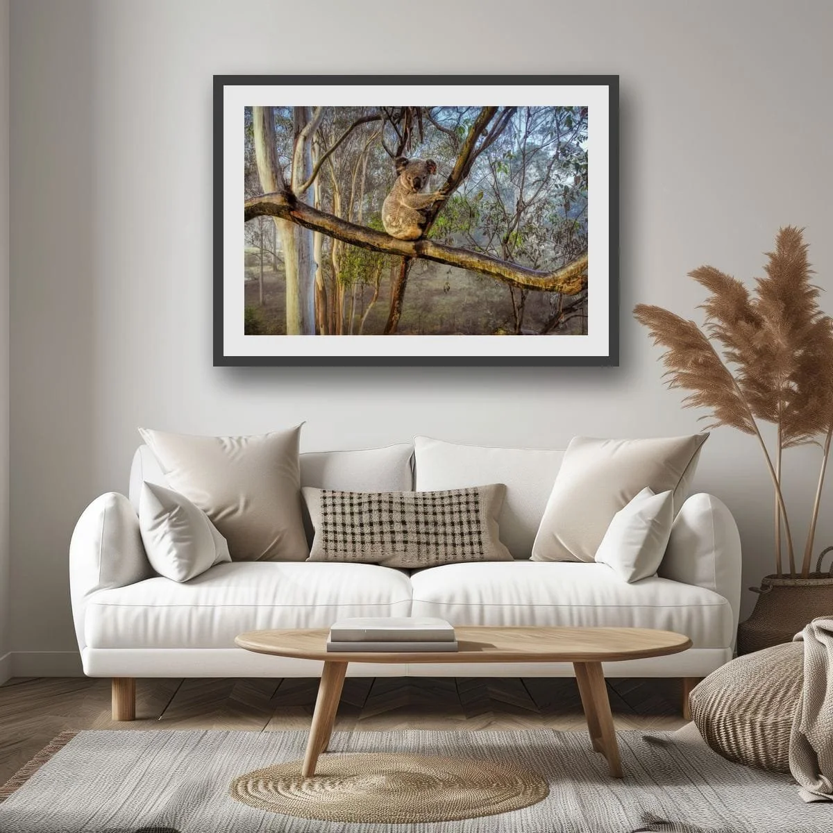 Koala hidden among eucalyptus branches and leaves.