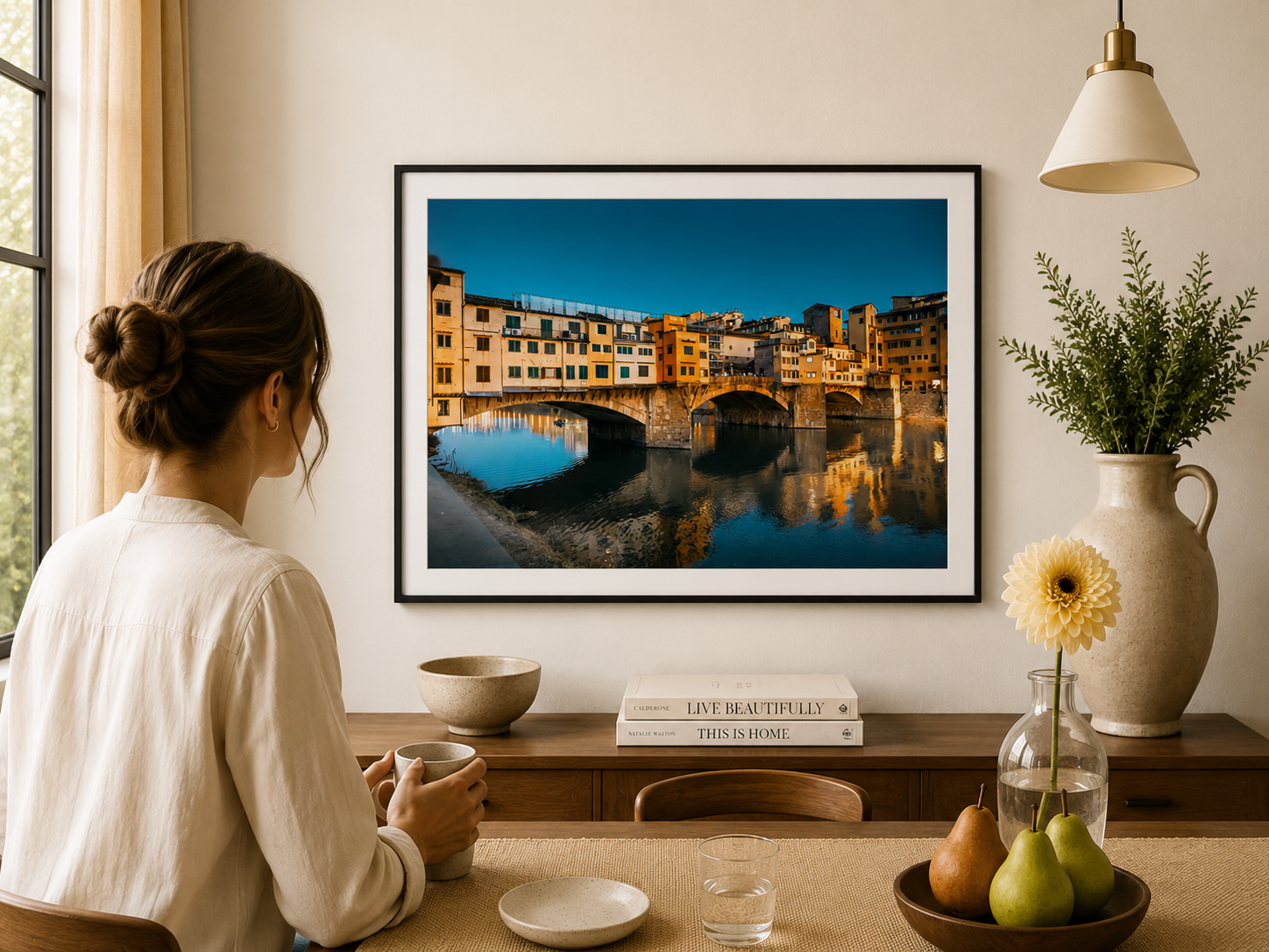 Ponte Vecchio bridge reflected in the Arno River at dusk.