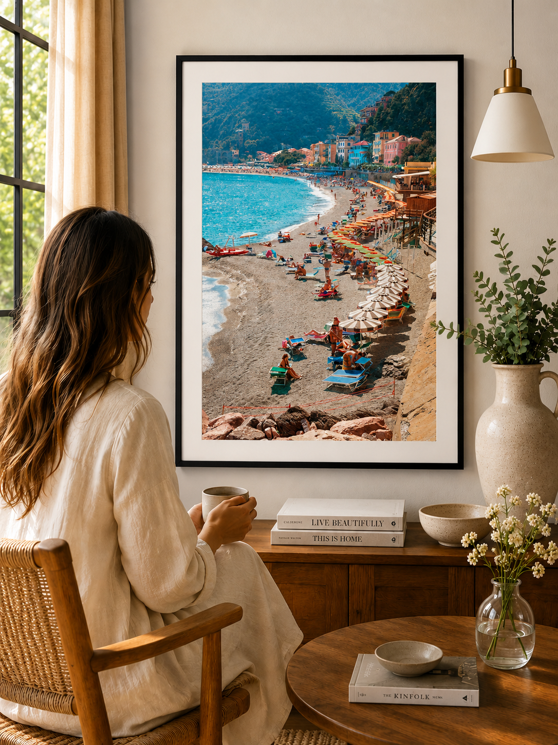 Busy Italian beach with colourful umbrellas and sunbathers.