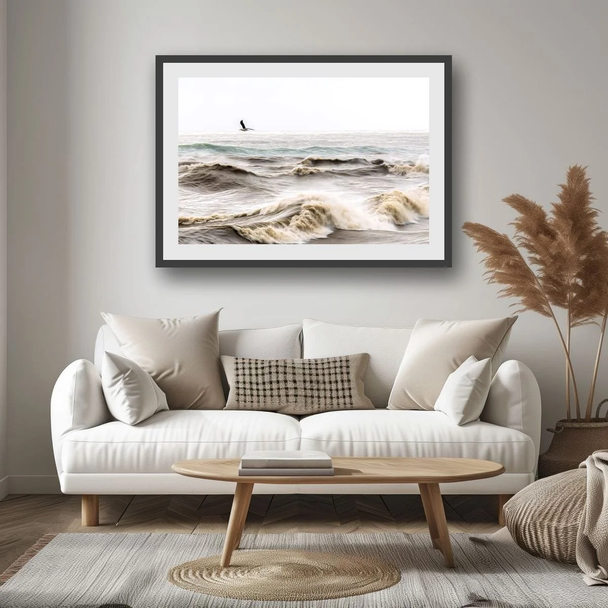 Seabird flying above rough ocean waves.