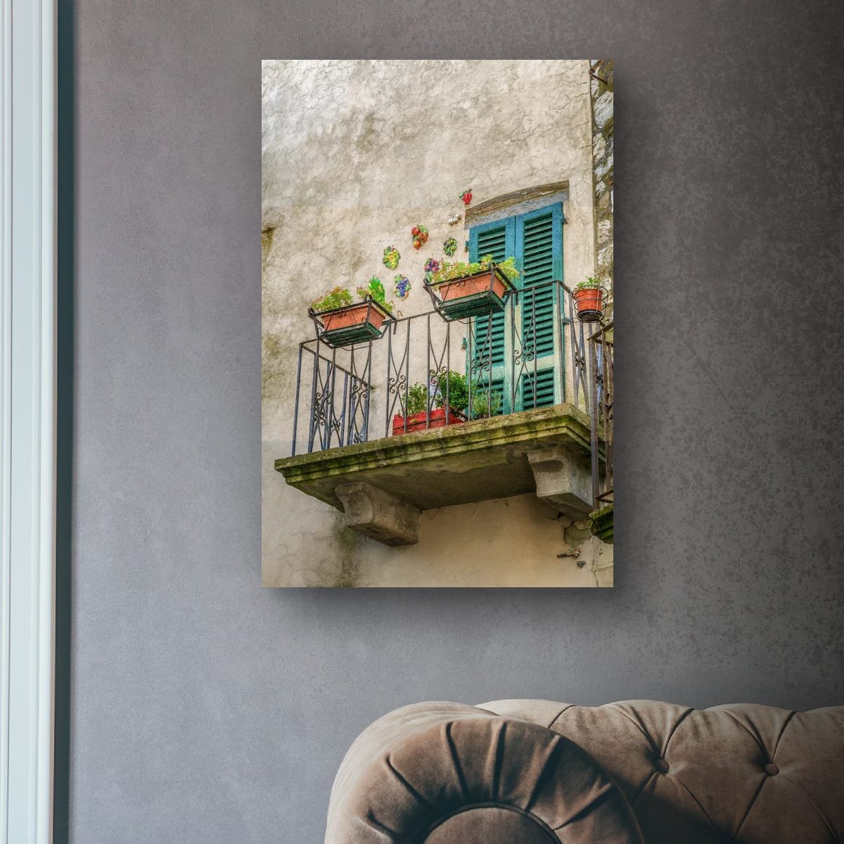 Tuscan balcony with green shutters, terracotta pots and aged stone walls.