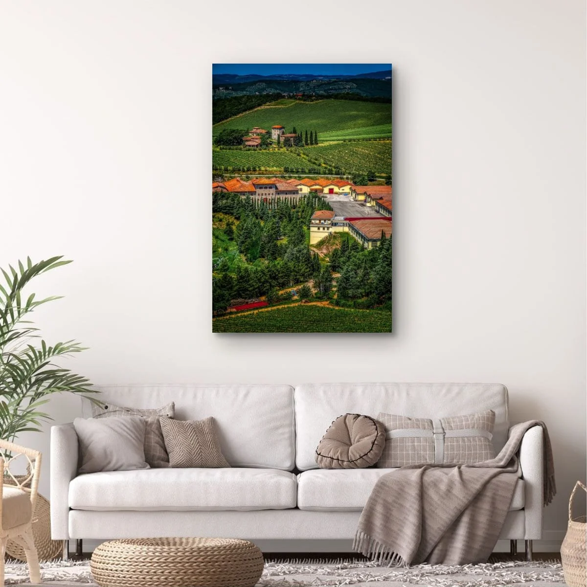 Tuscan countryside with vineyards, cypress trees and rolling hills.