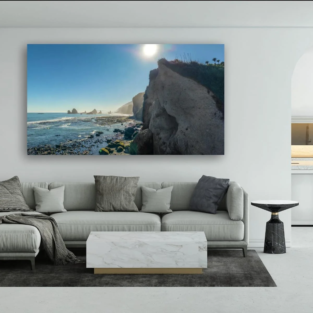 Rugged coastline with cliffs, sea stacks and rocky shoreline.