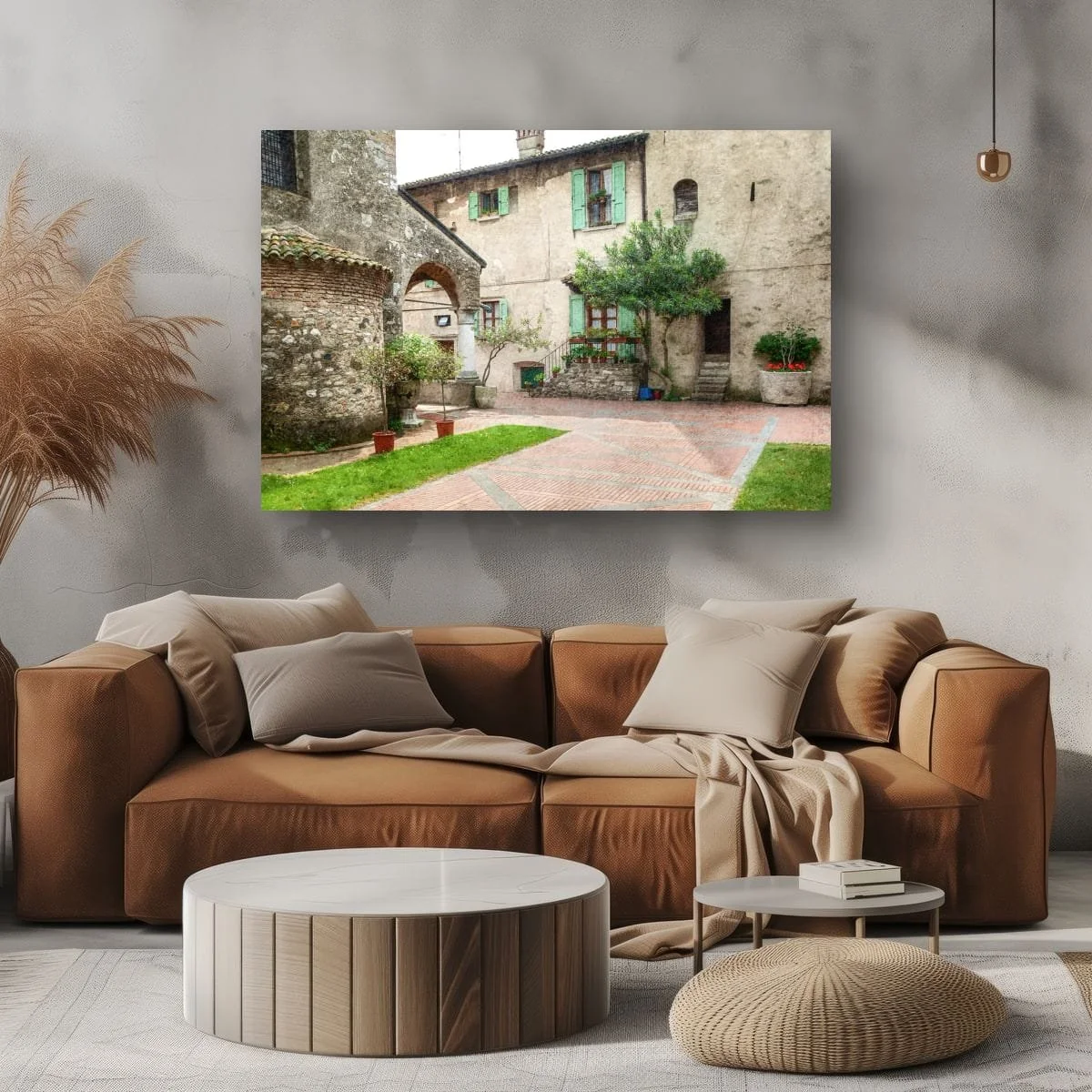Quiet Tuscan courtyard with stone walls, potted plants and historic architecture.