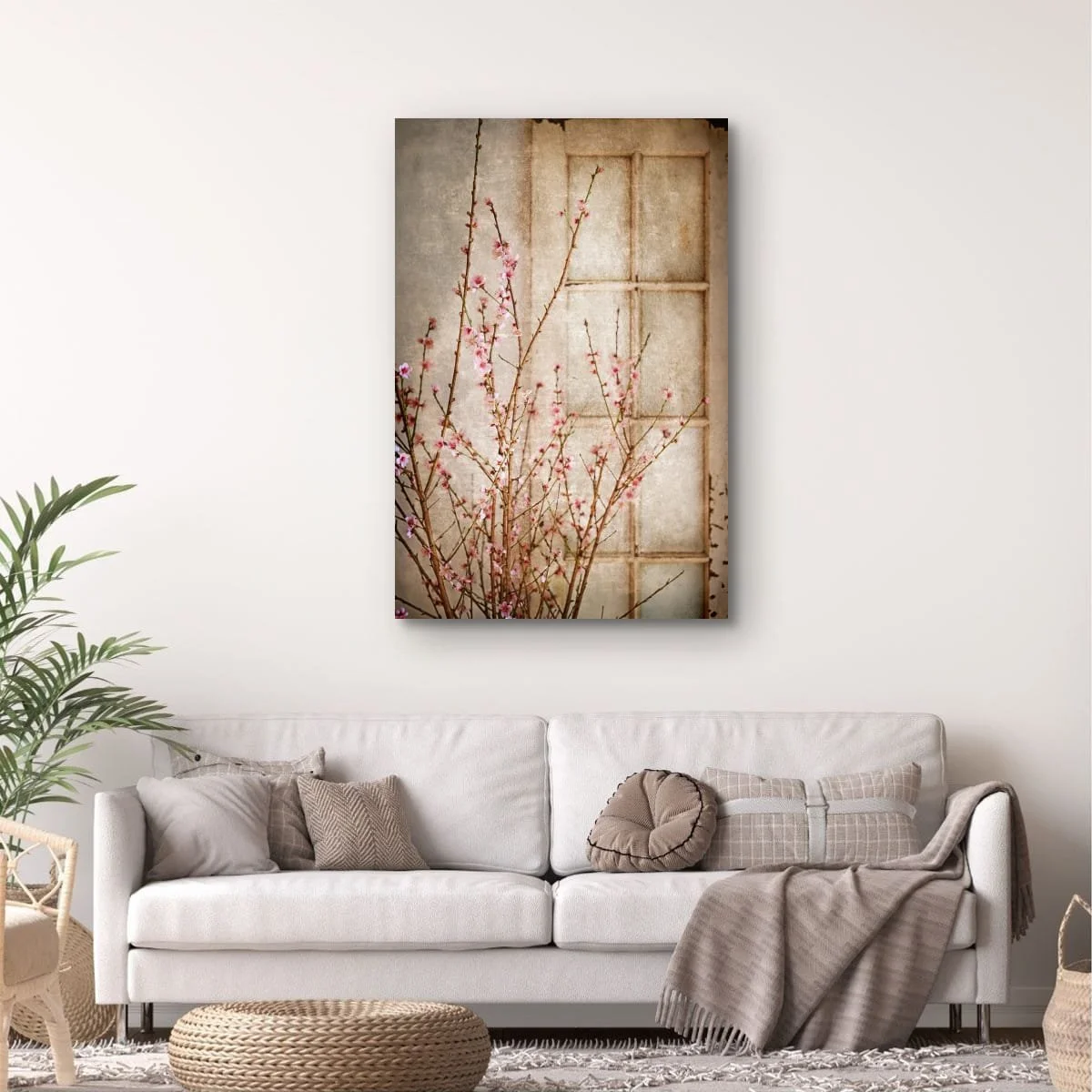 Pink blossom branches against a softly textured background.