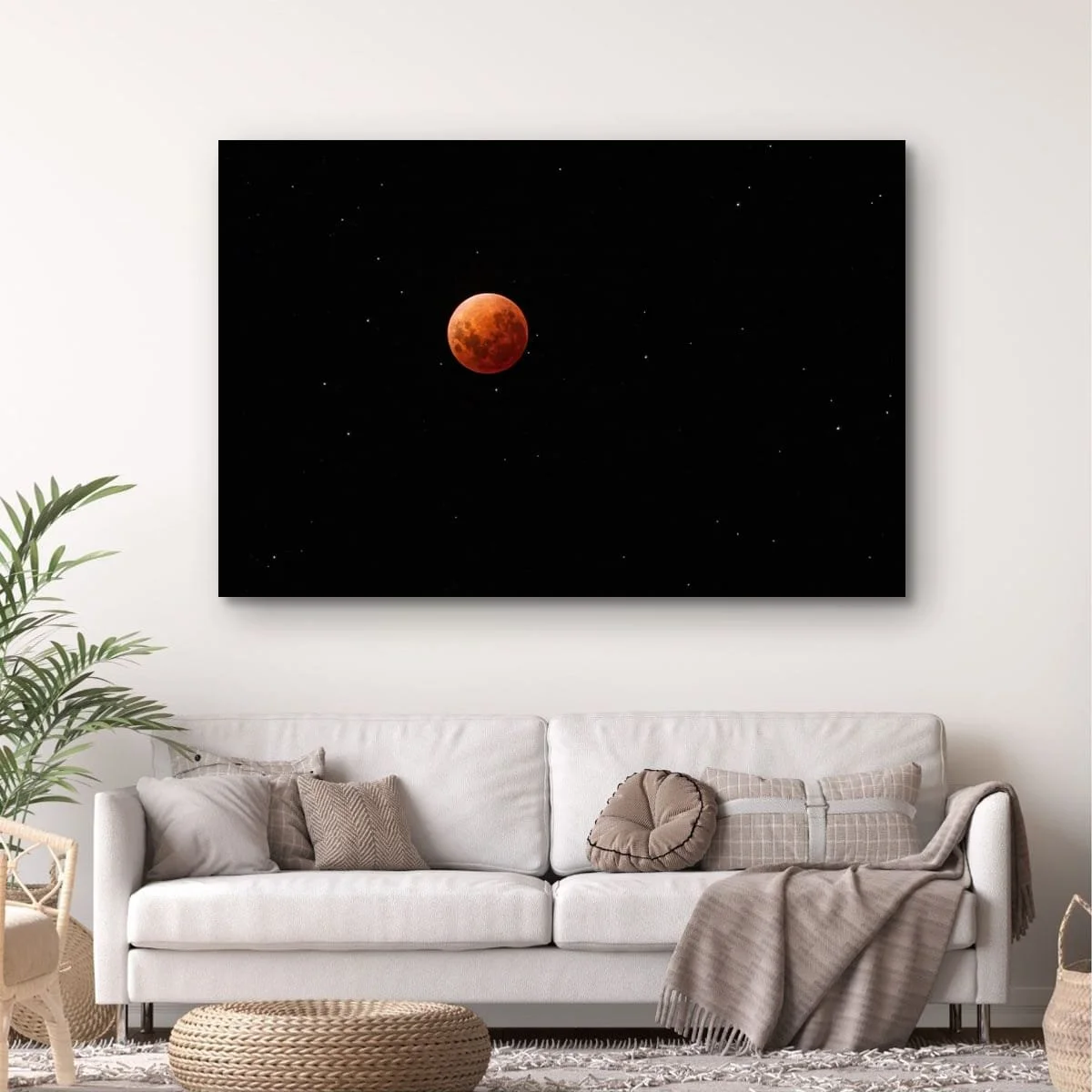 Blood moon lunar eclipse surrounded by stars.
