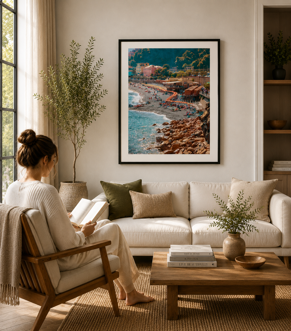 Italian beach scene with umbrellas, people and coastal buildings.