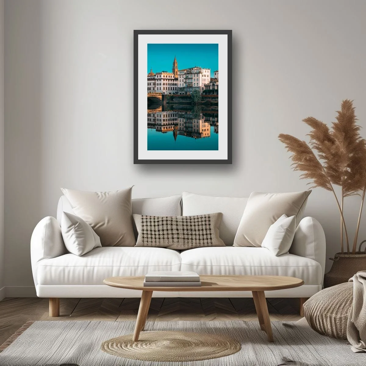 Tuscan buildings and church reflected in calm water.