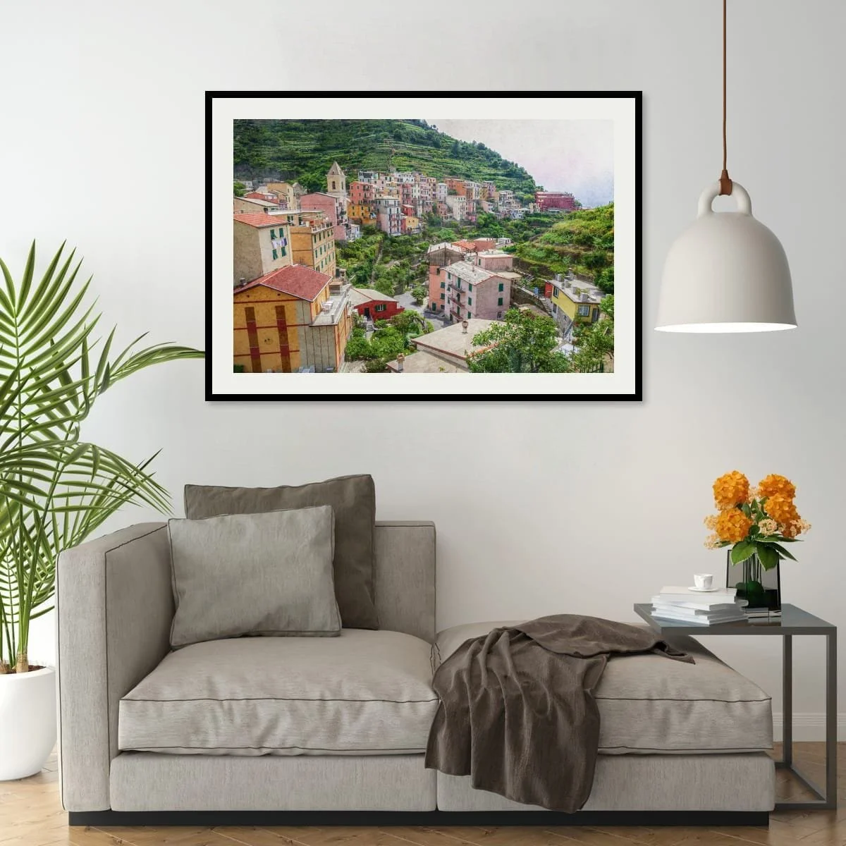Colourful hillside village with terraces and gardens in Italy.