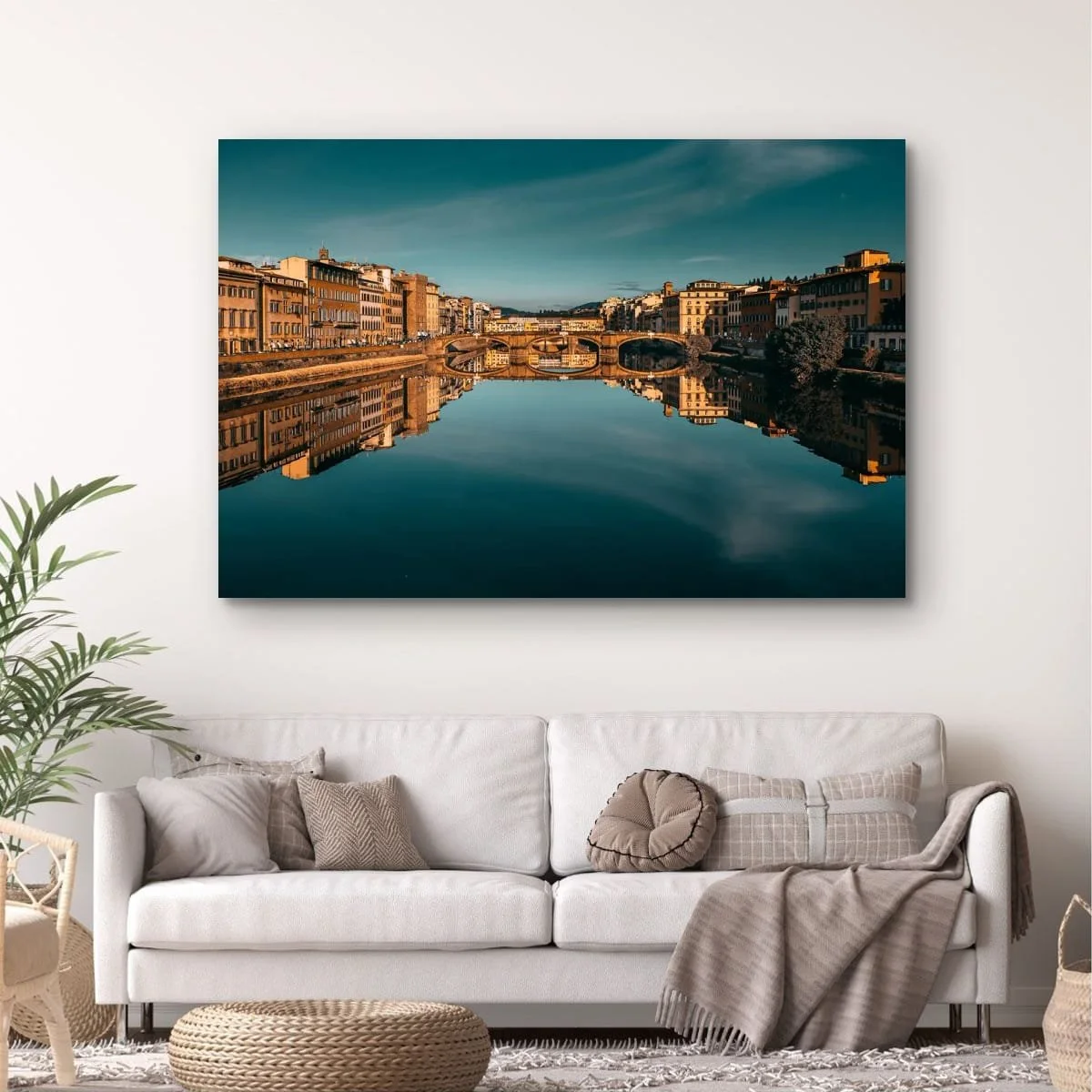 Florence cityscape reflected in the Arno River.