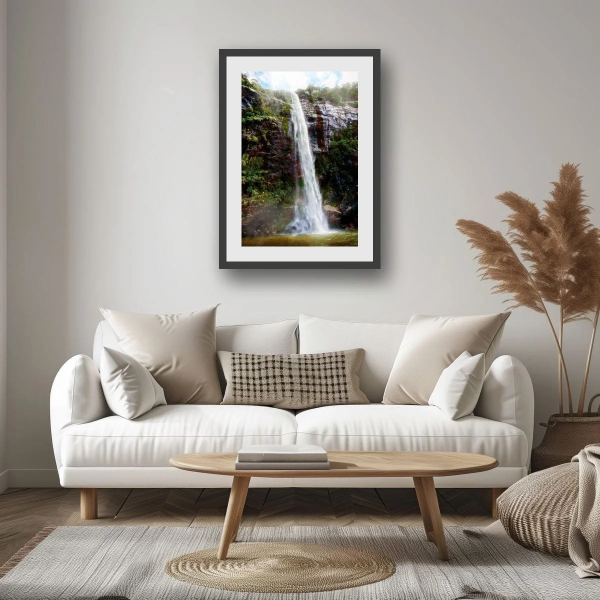 Waterfall flowing down a cliff face in Milford Sound surrounded by rainforest.