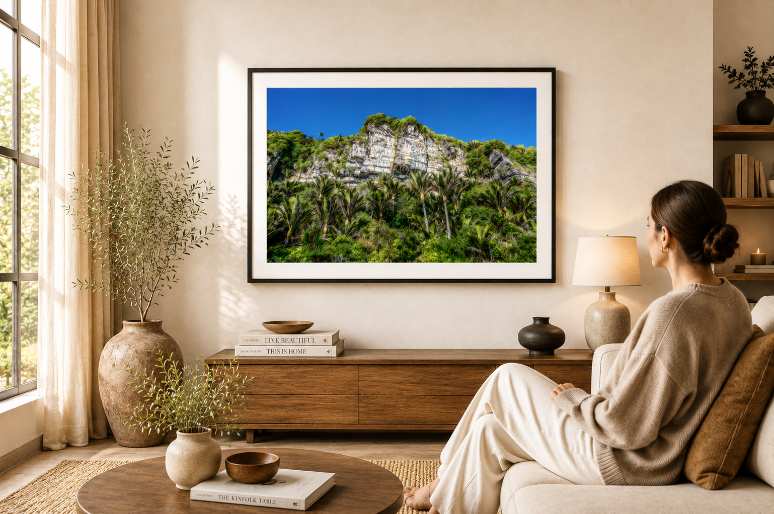 Limestone cliffs towering above native nikau palms.