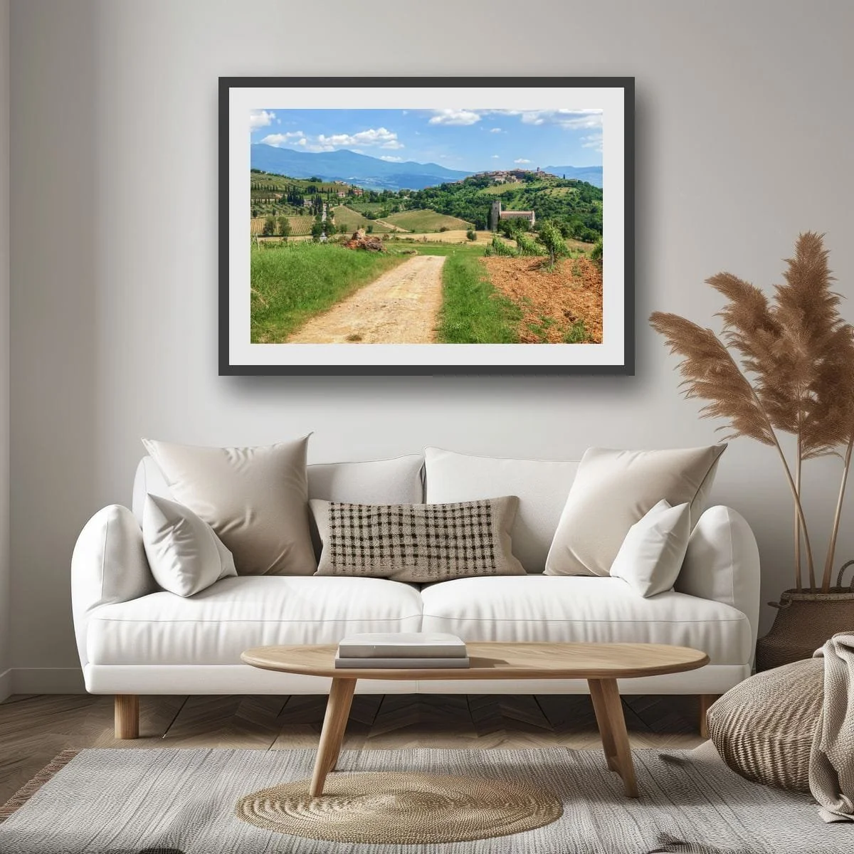 Rolling Tuscan hills with vineyards and historic hilltop village.