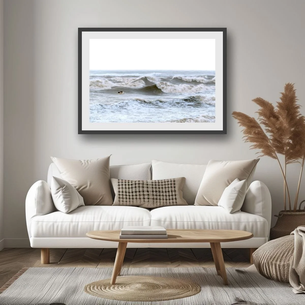 Seagull flying low above rough ocean waves on the West Coast.
