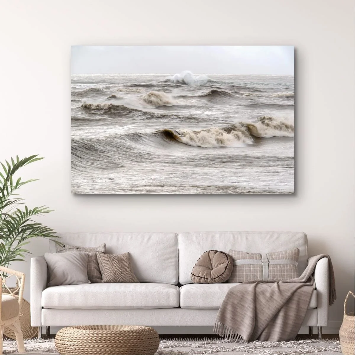 Powerful ocean waves rolling across the West Coast shoreline.
