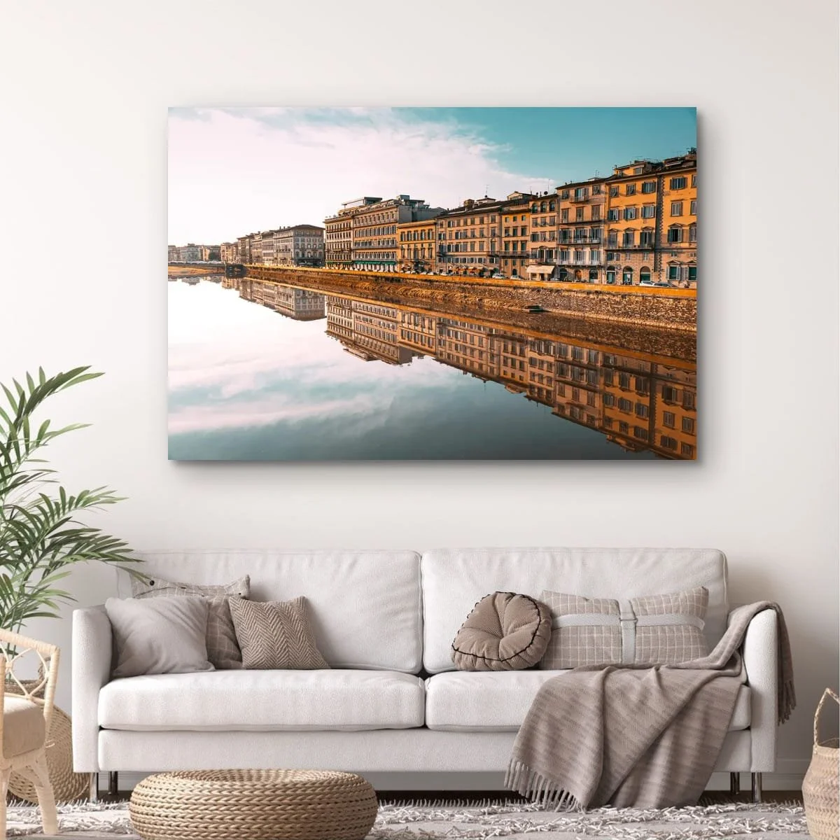 Golden reflections of Florence buildings in the river.