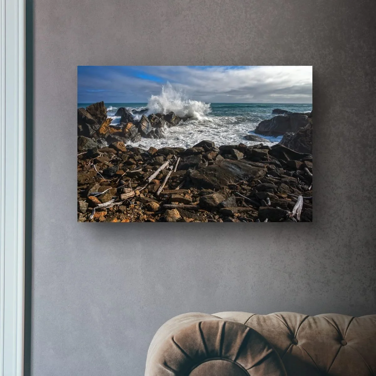 Ocean waves crashing against rocky coastline on the West Coast.