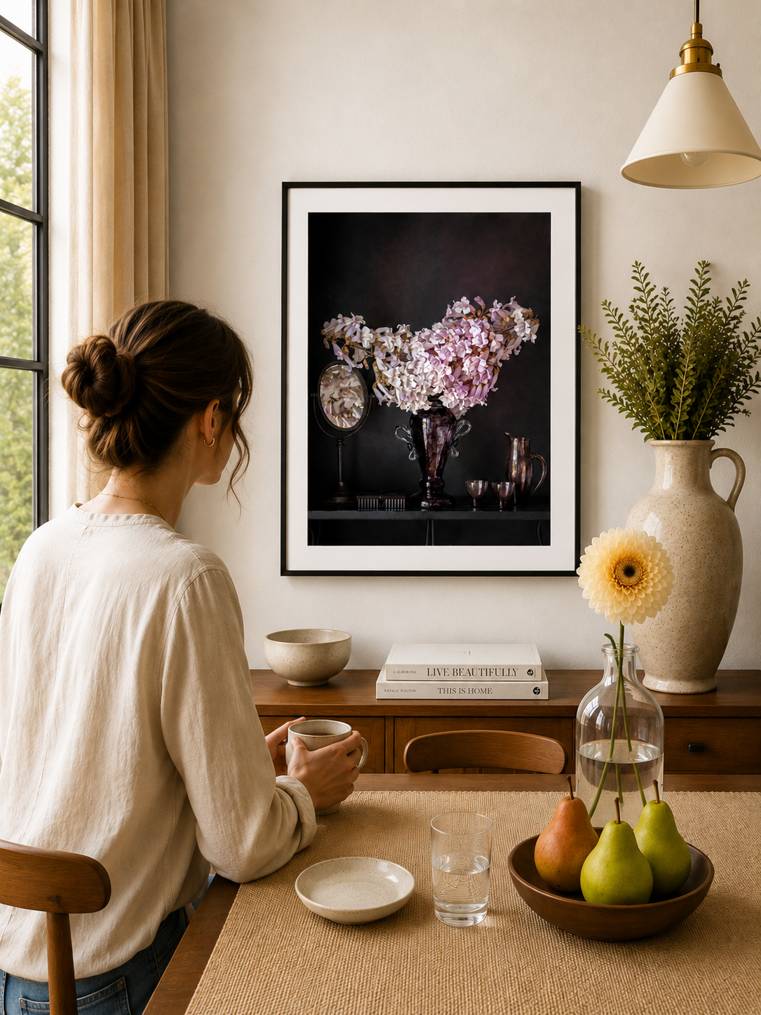 Pale pink flowers arranged in vintage glass vessels.
