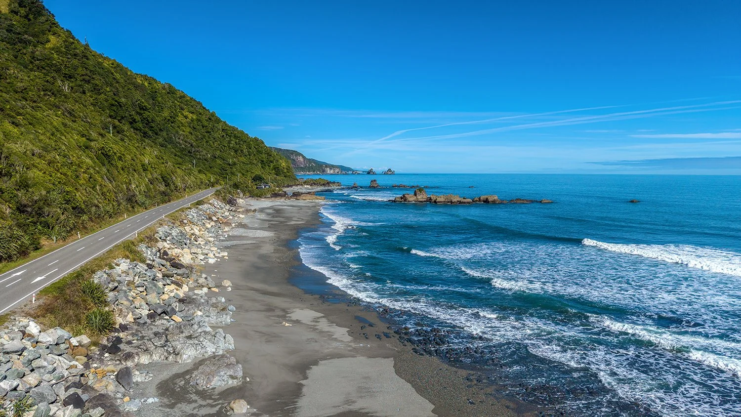 Coastal road following the West Coast shoreline