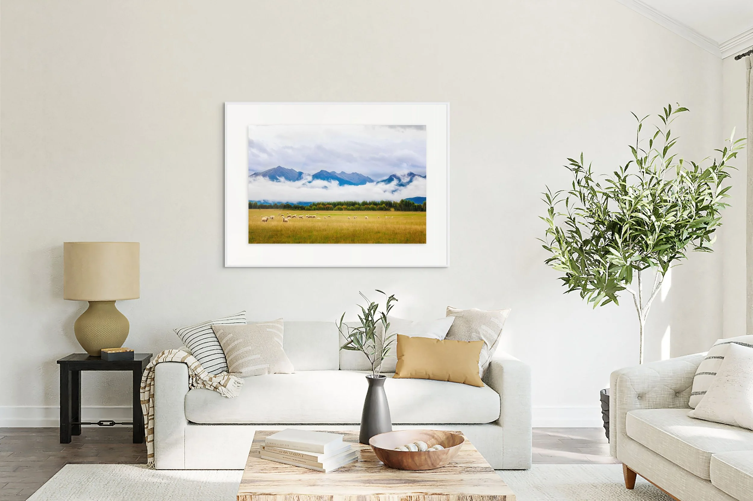 Painterly travel fine art photograph of rolling land, grazing sheep, and mountains beyond - this is that classic new zealand feeling people fall in love with, by From The Field.