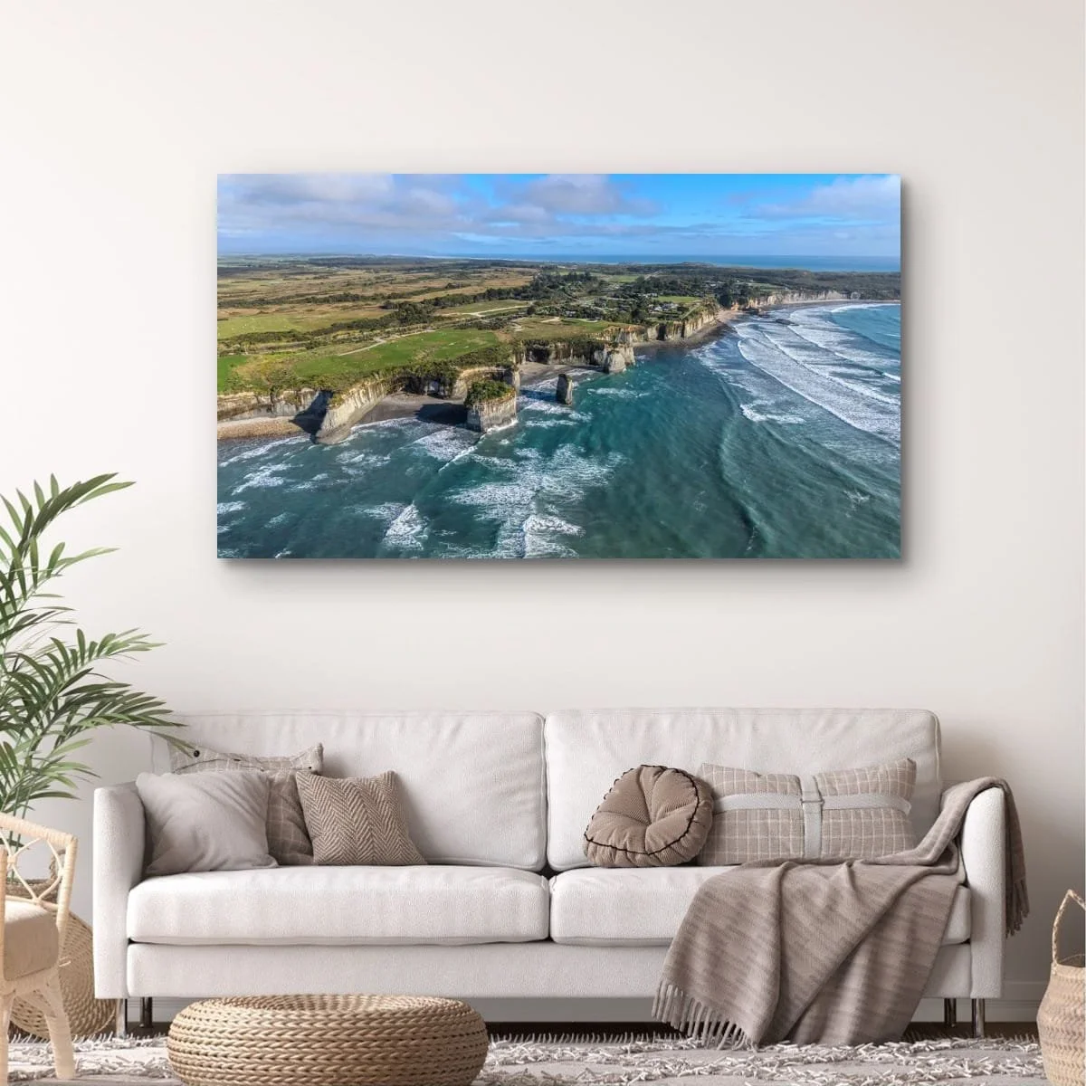 Aerial photograph of rugged coastal cliffs and ocean on New Zealand's West Coast.