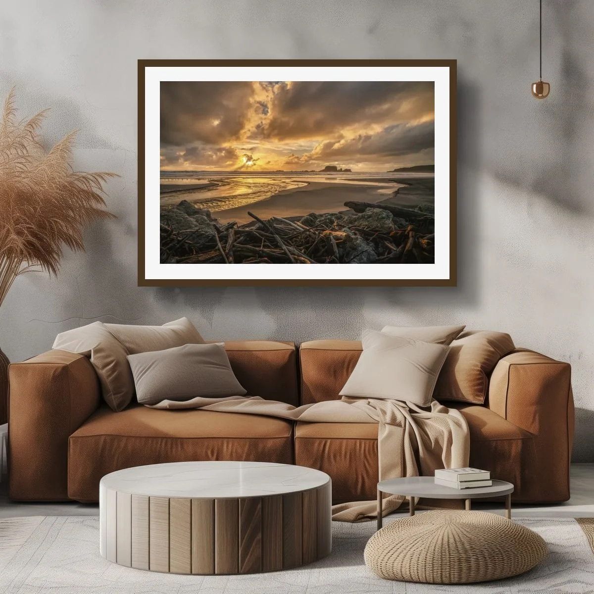 Golden sunset reflecting through a tidal stream across dark sand, driftwood and a West Coast beach.