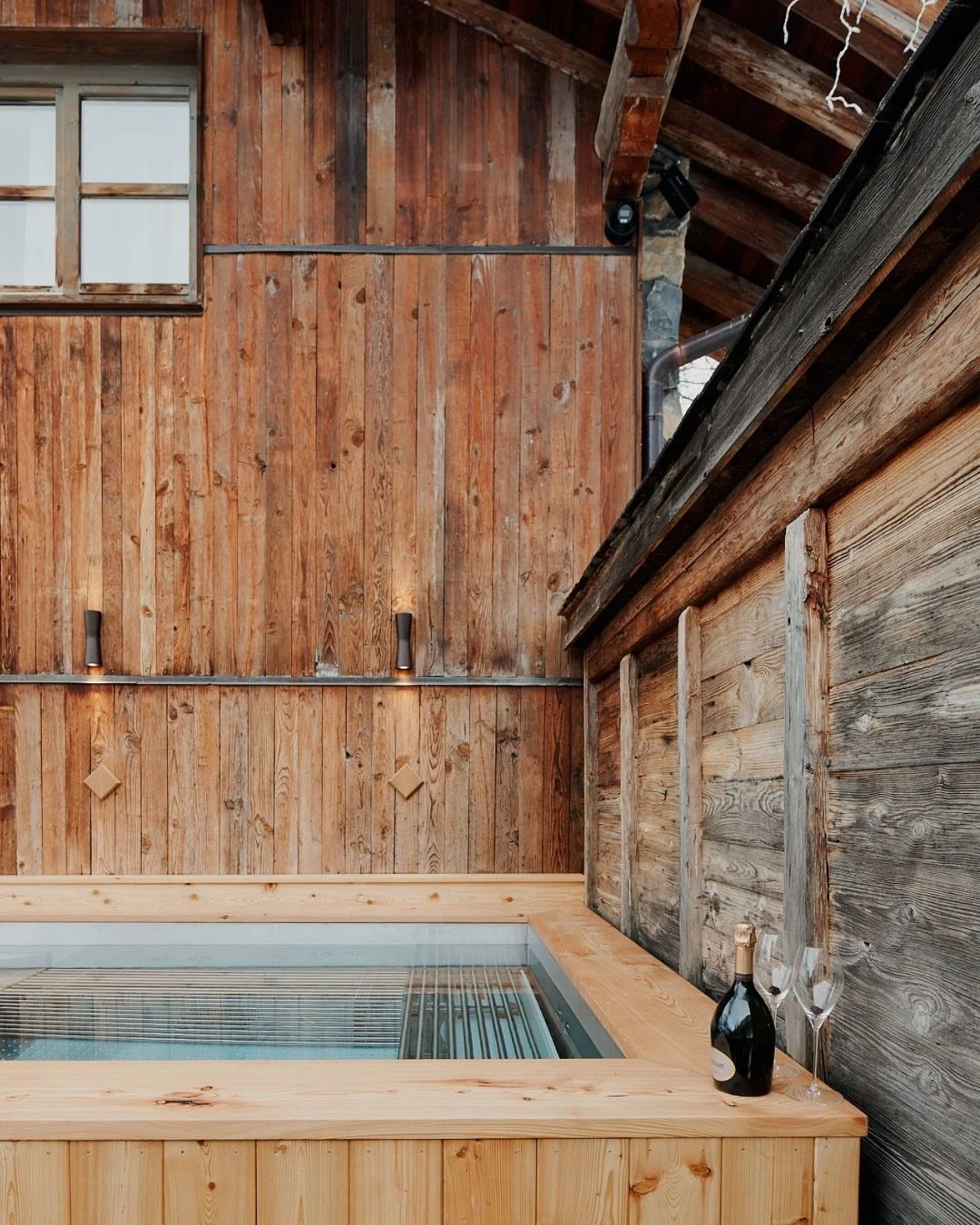 I&rsquo;ve always liked the way timber keeps changing after we&rsquo;ve finished with it.

Reclaimed boards read differently depending on the season. In winter, against snow and low light, they look dark and sheltering. Come summer, the grain opens o