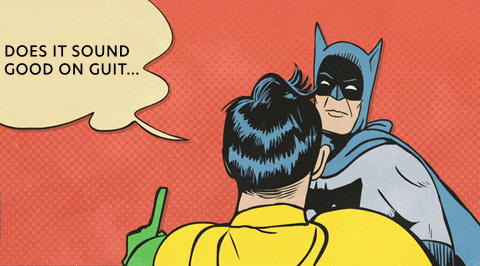 Batman and Robin having a conversation, with Batman asking if it sounds good on guitar.