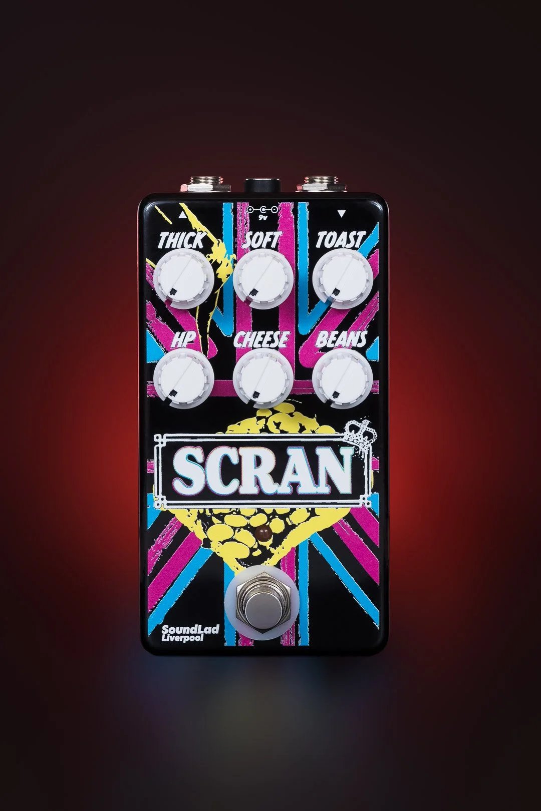Guitar effects pedal with colorful design, labeled 'SCRAN', featuring six knobs labeled intense, soft, toast, HP, cheese, and beans, with a footswitch at the bottom, created by SoundLab Liverpool.