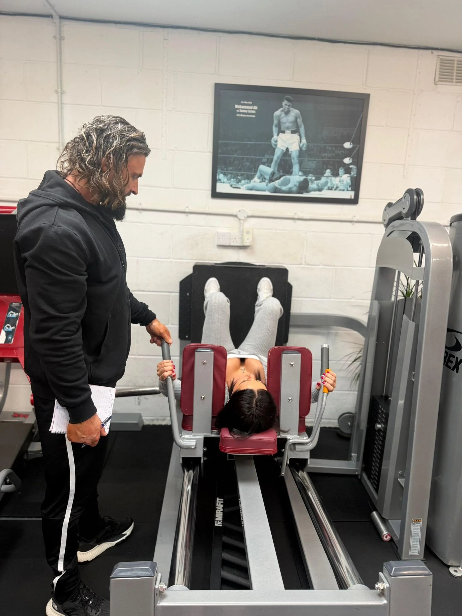 Cole training with a female client