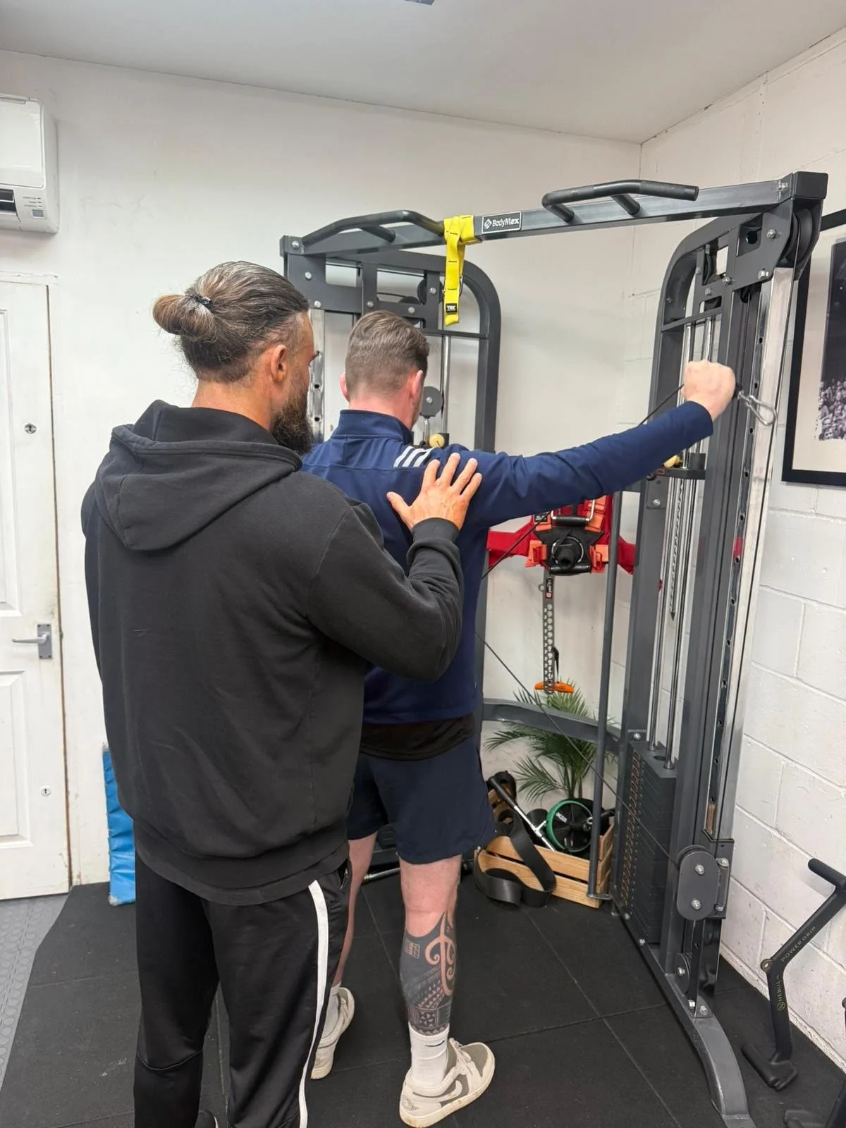 Cole training with a male client