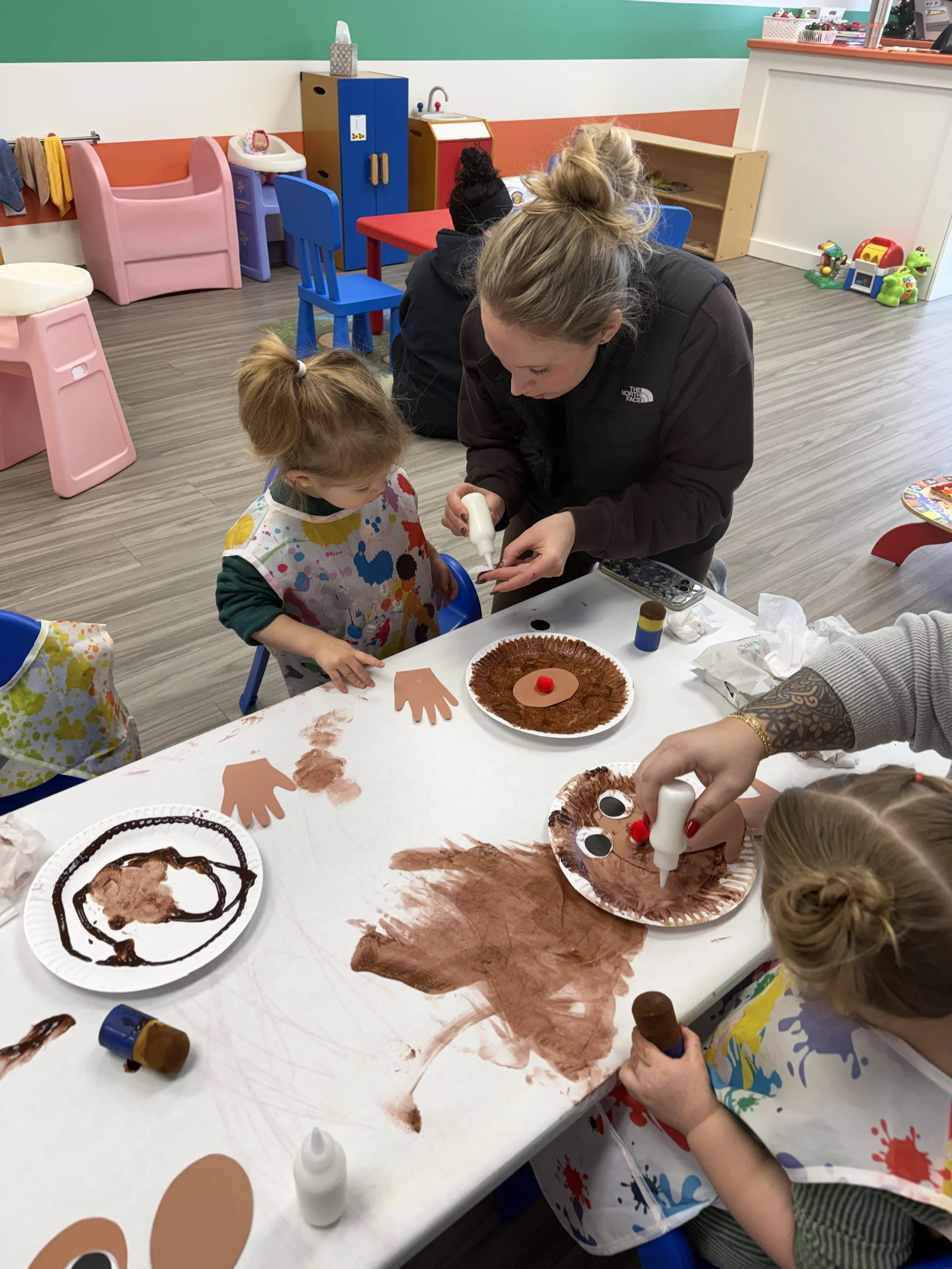 Mommy and toddler creating a themed hands-on art activity during a Kid Ka Doodle class in Flemington, NJ