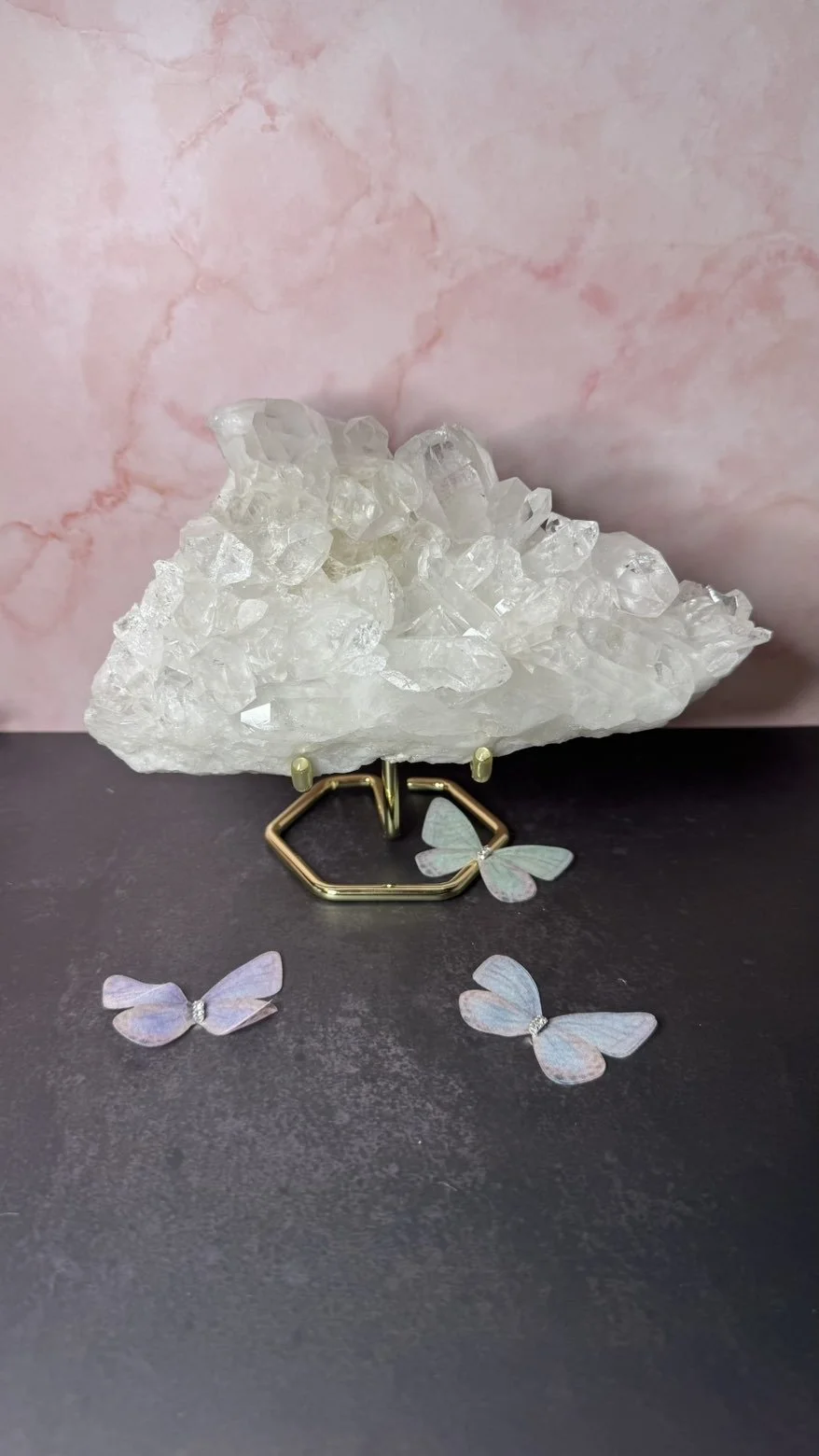 Clear quartz cluster on stand
