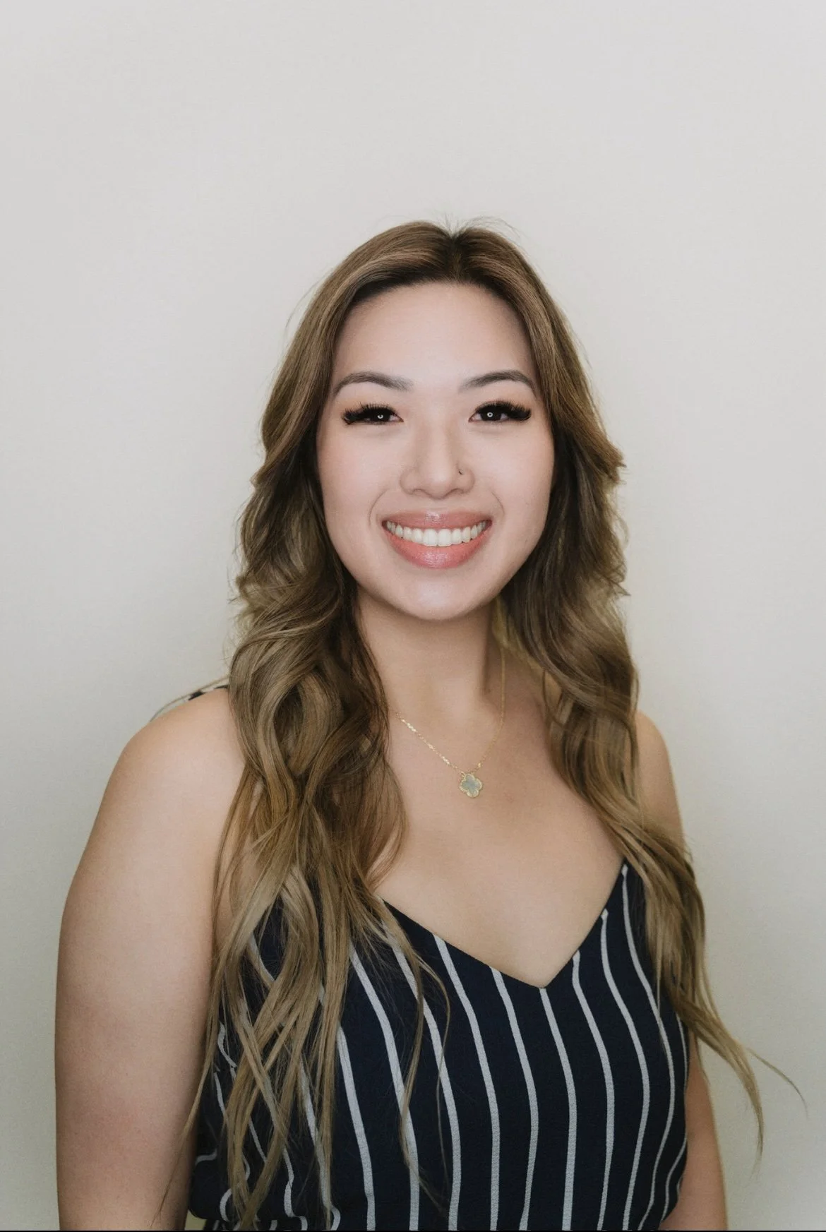 Portrait image of Alyssa, founder of Glow Aura Wax Studio