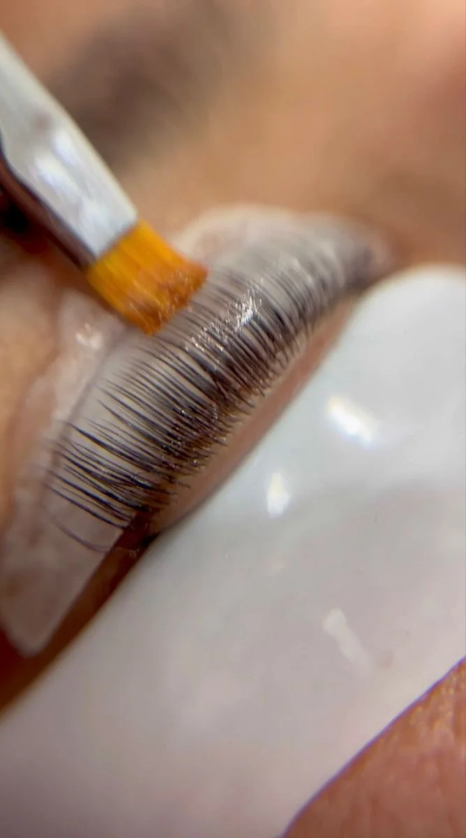 Close-up of eyelash undergoing a lash lift procedure