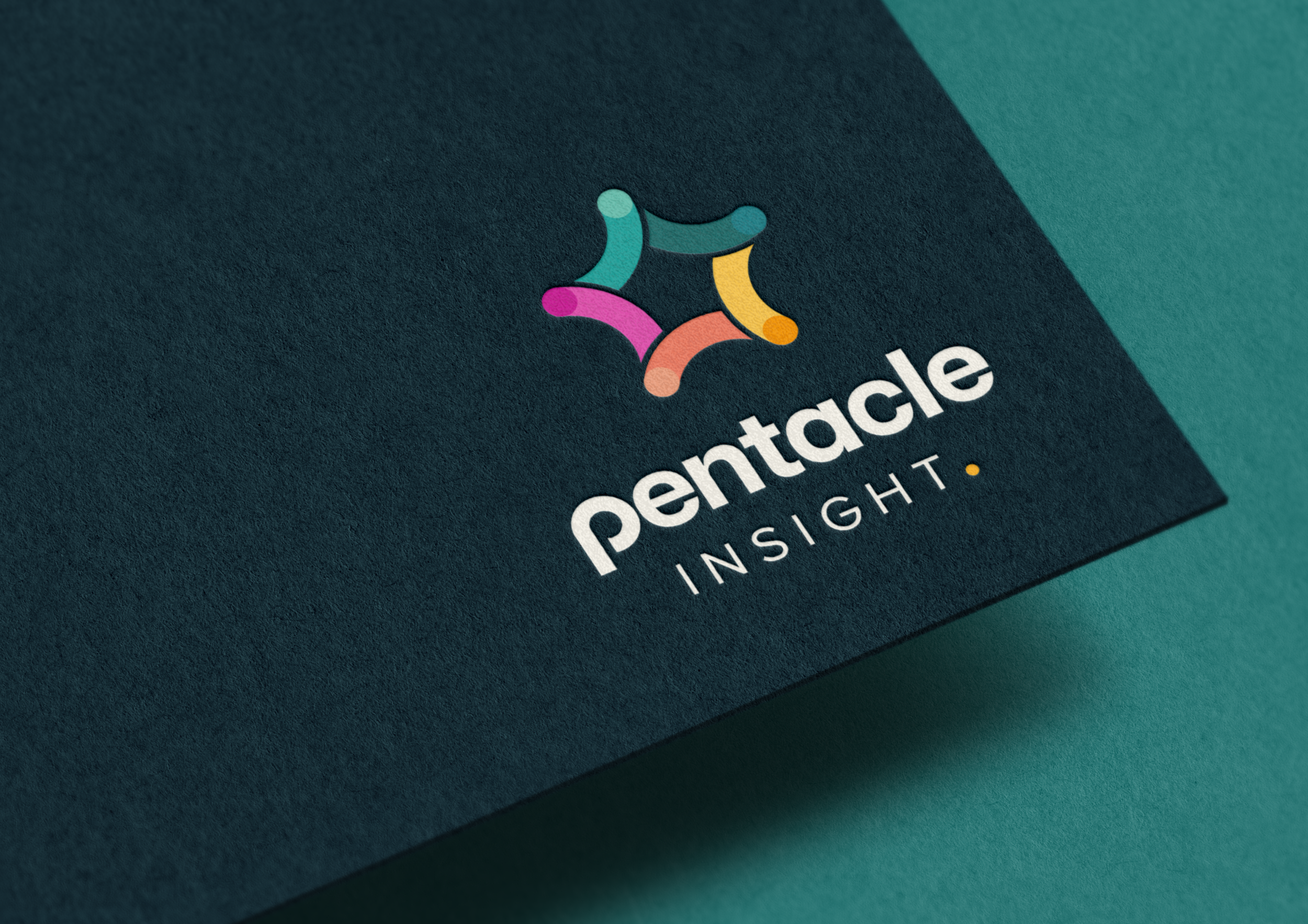 Close-up of a dark teal textured surface with a colorful logo featuring interconnected curved shapes in teal, yellow, pink, and orange, along with the text 'Pentacle Insight' in white.