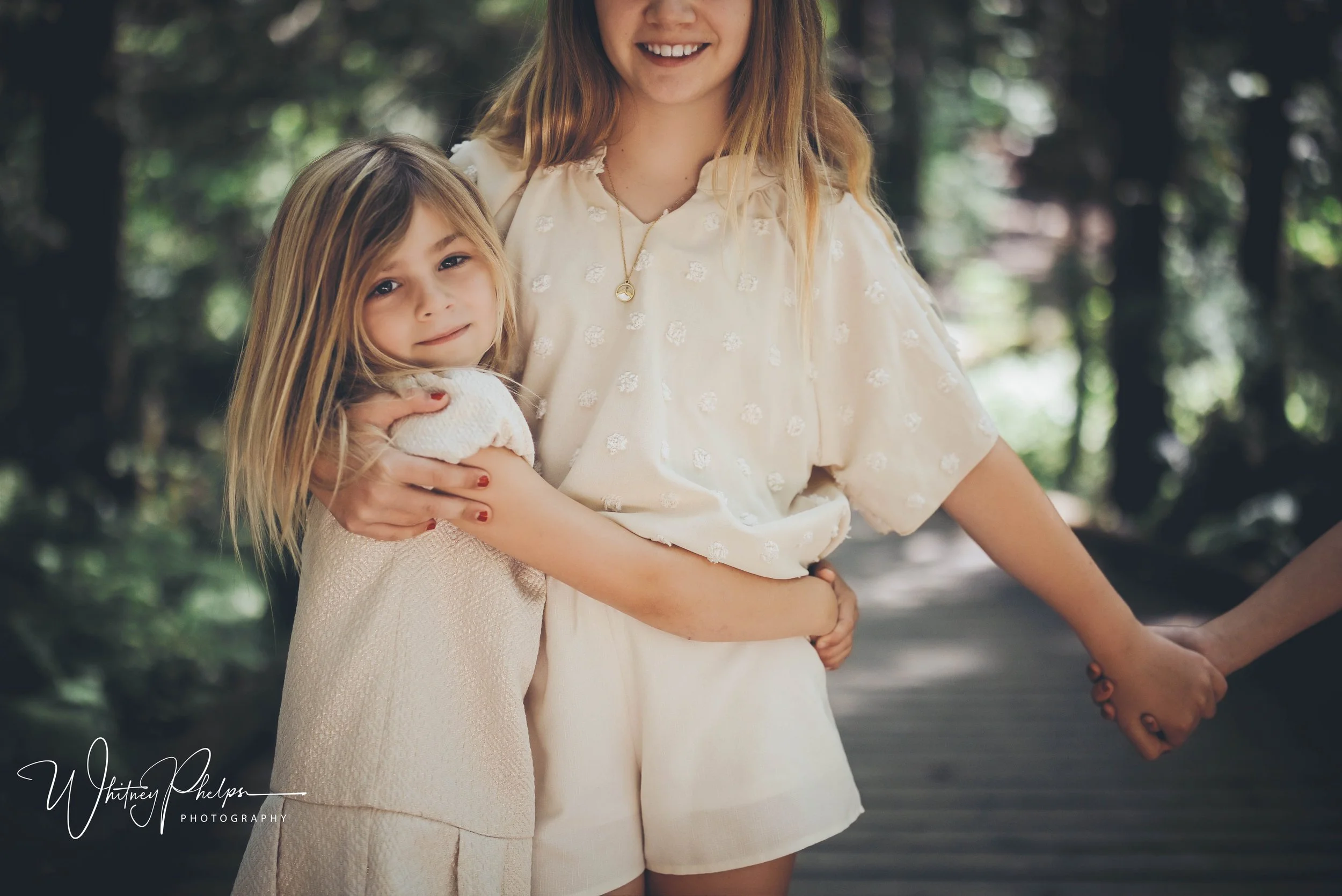 Sisterhood, smiles, and sweet moments among the trees at Sehmel Homestead Park.