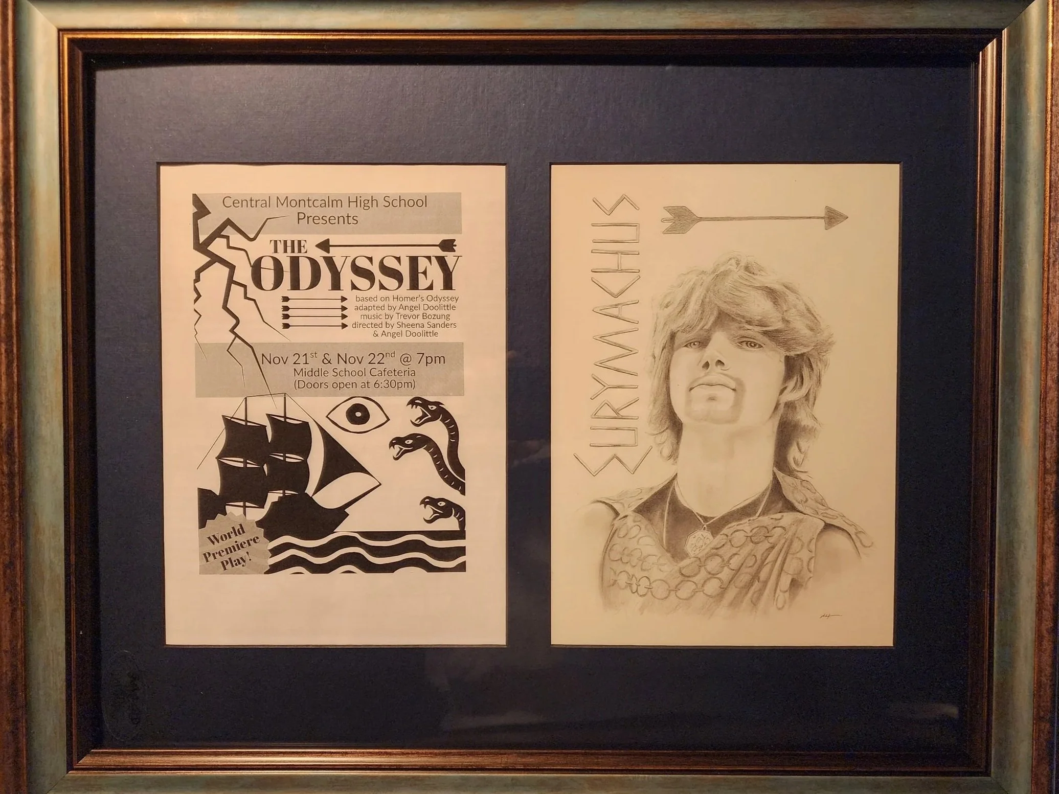 A framed display with two pieces of artwork. The left piece is a poster for a school production of "The Odyssey" with pirate ships and mythical sea creatures, and the right piece is a pencil drawing of one of the performers of the show