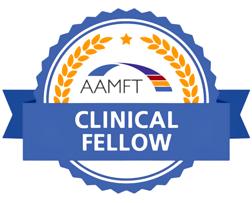A badge with a blue ribbon, gold laurel leaves, and a stylized medical cross, with the words 'AMFT Clinical Fellow'.