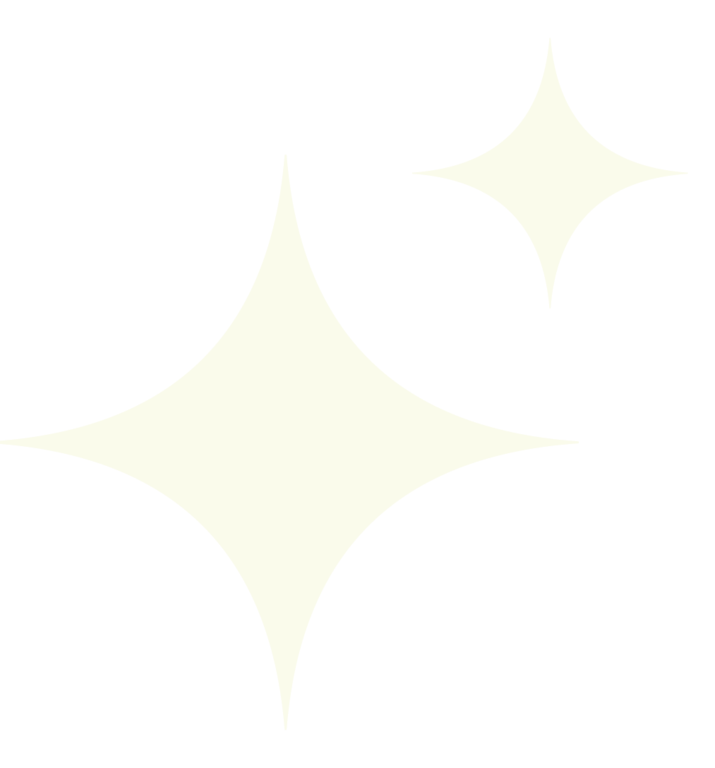Four white shining stars of different sizes on a black background.