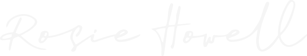 Signature of Rosie Howell in white cursive on a black background.