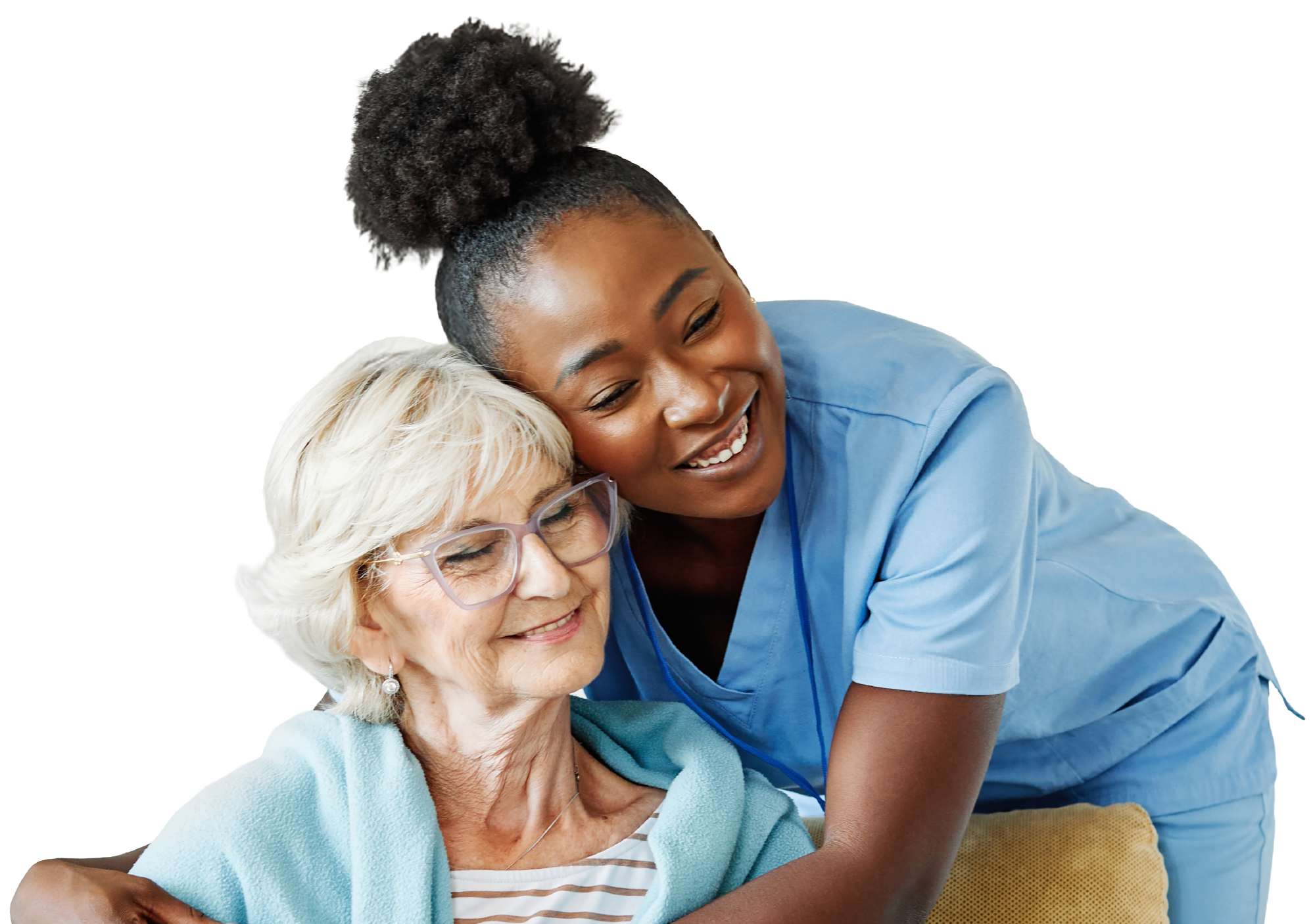 A healthcare worker hugging an elderly woman with glasses and white hair, both smiling warmly.