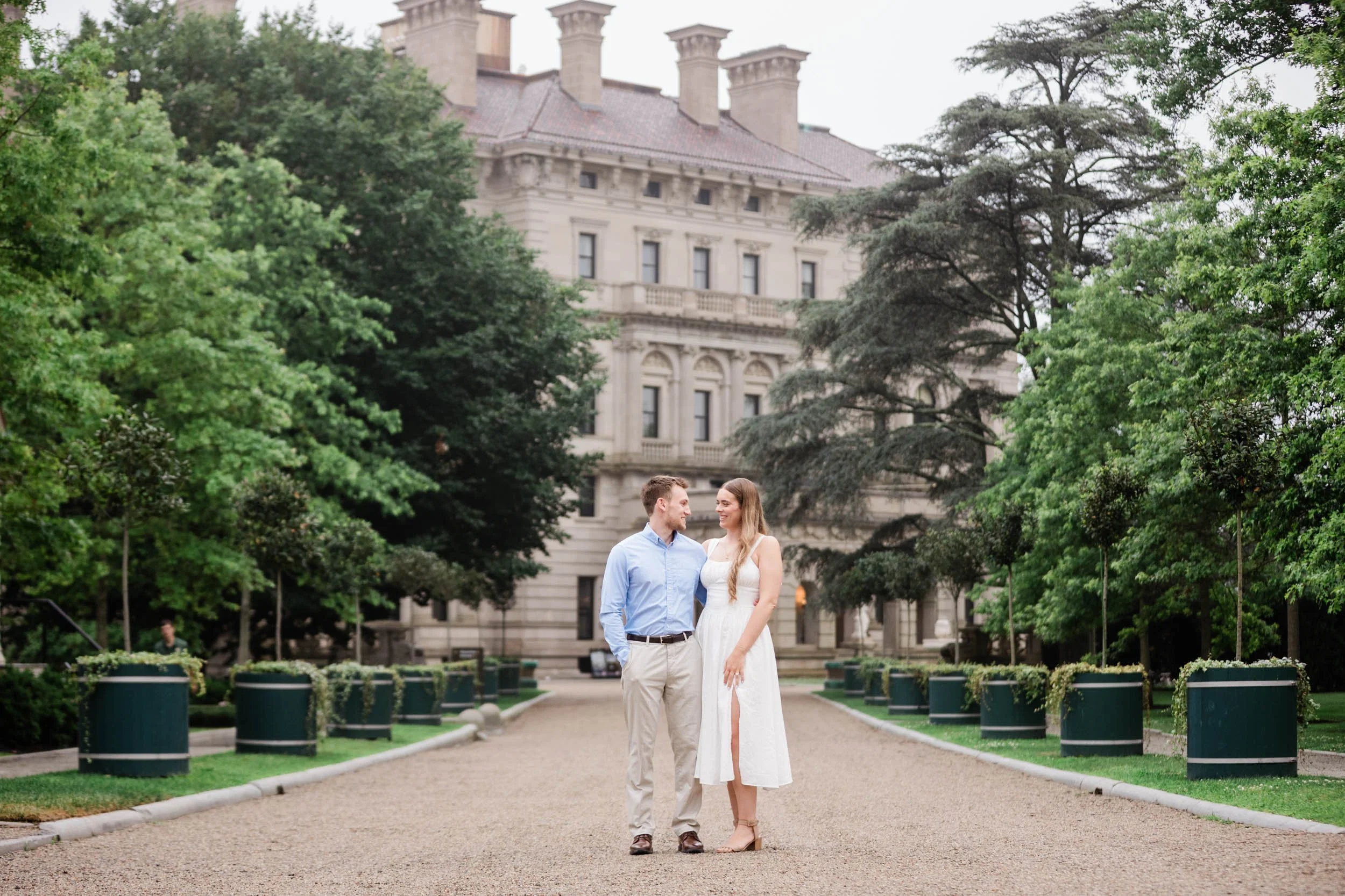 An engagement session on the front drive of The Breakers in Newport