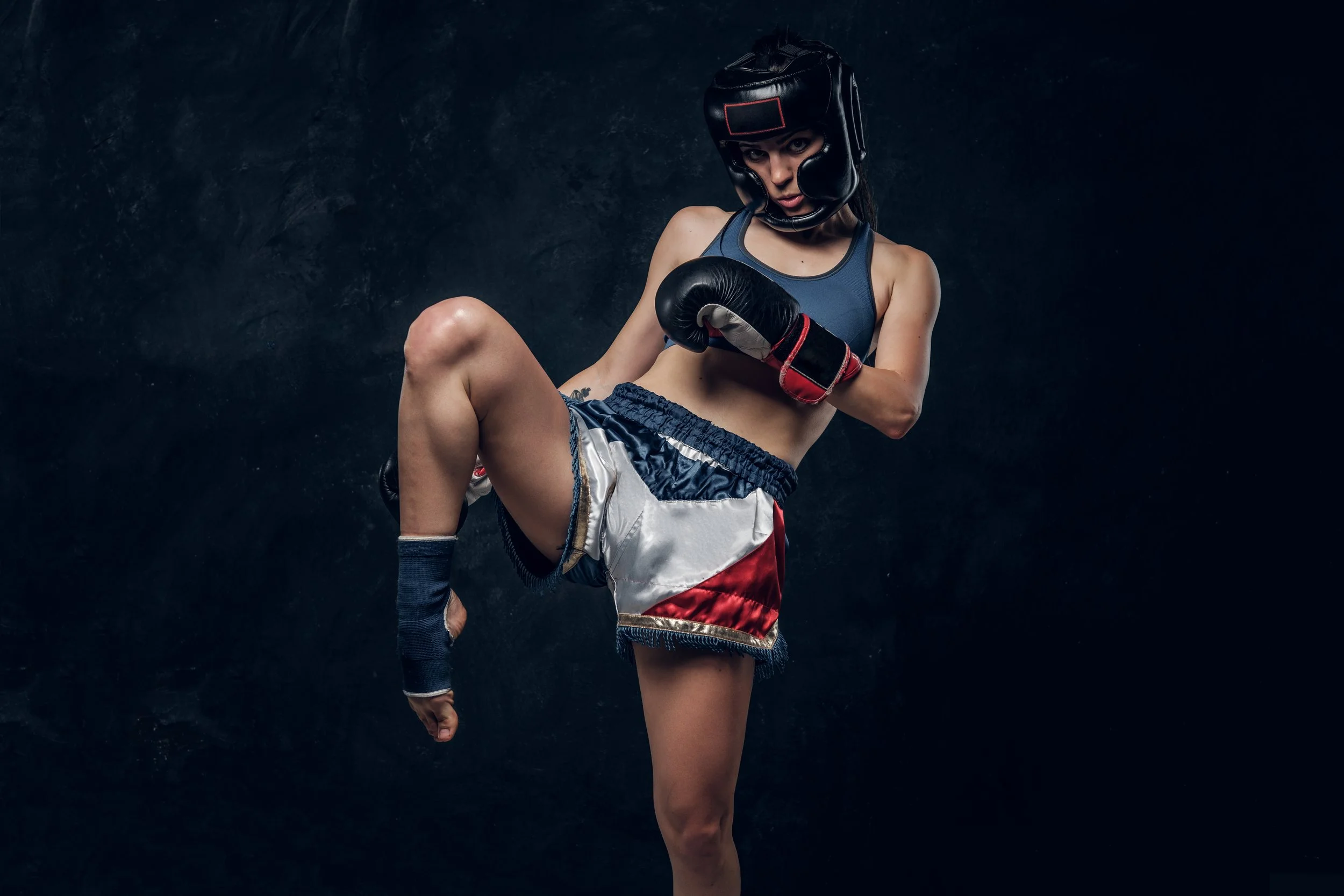 pretty-strong-woman-is-demonstrating-her-kick-boxer-pose-while-posing-photographer.jpg