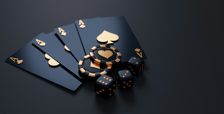A set of playing cards, poker chips, and three dice on a dark surface.