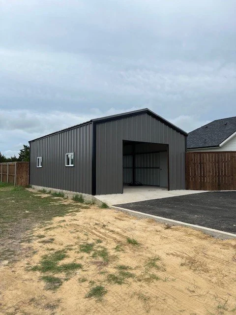 New metal building in fort worth texas with a single rolling garage door